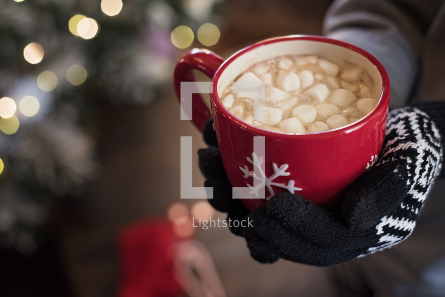 marshmallows and hot cocoa in a red mug 