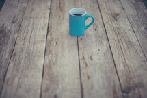 coffee mug on wood