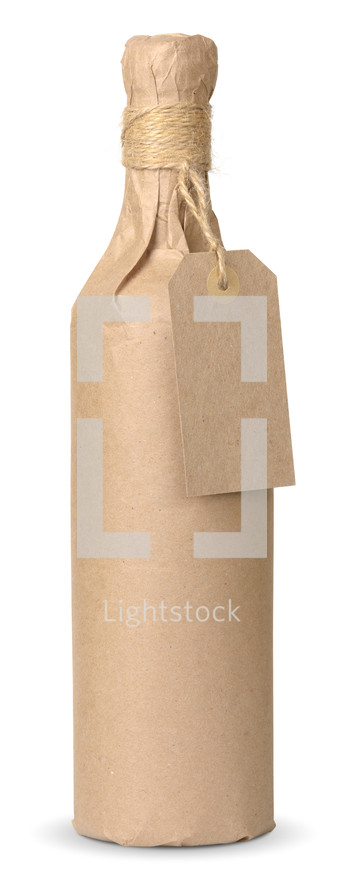bottle of wine wrapped in brown paper 