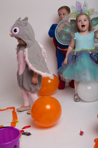 children in Halloween costumes 