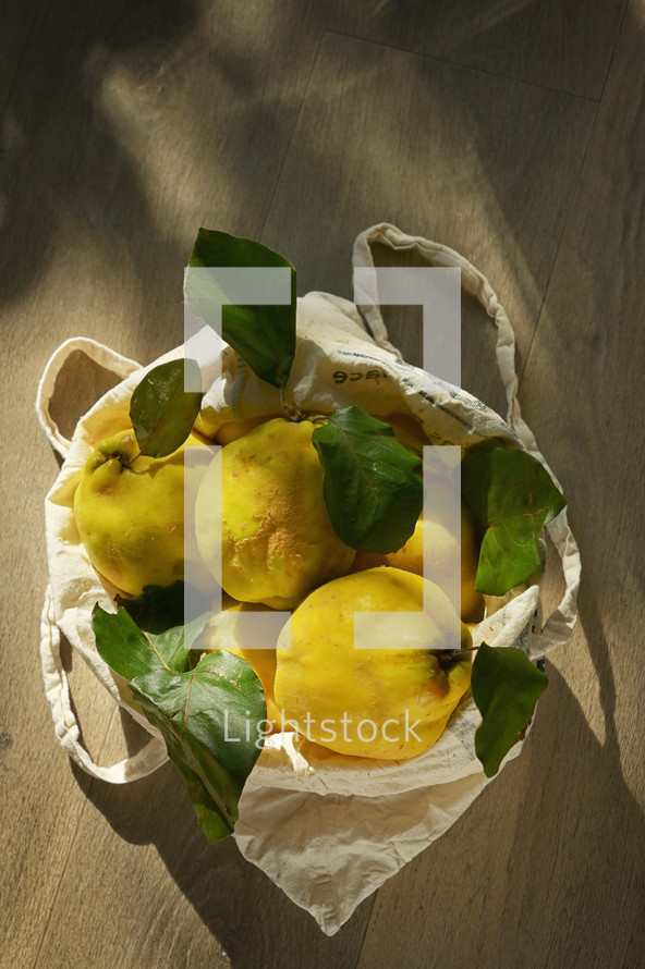 A canvas bag of pears