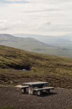 picnic table on a mountaintop 