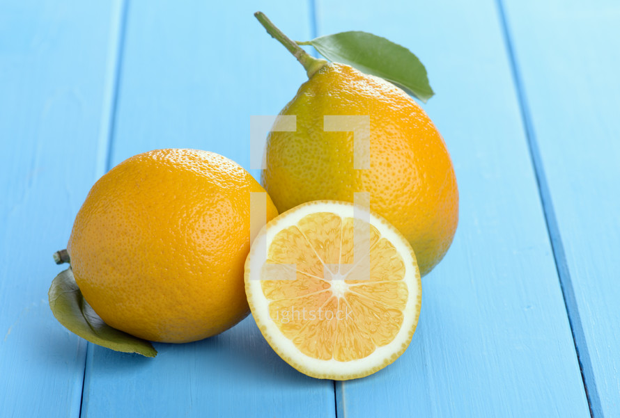 lemons on a blue table