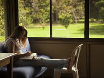 woman reading a Book studying 