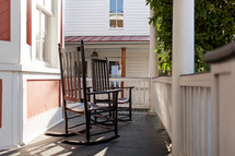 rocking chairs on a porch 