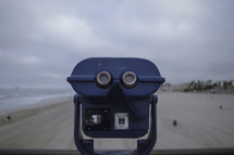 View finder scope on a beach | Vision | Perspective | Sand | Ocean | People | Sky | Sight | 