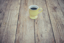 coffee mug on a wood table