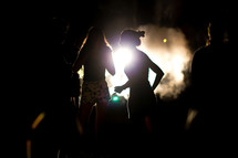 silhouettes of teen girls at night