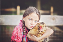 girl with a chicken 