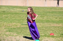 a child in a sack race 