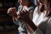 Women praying together