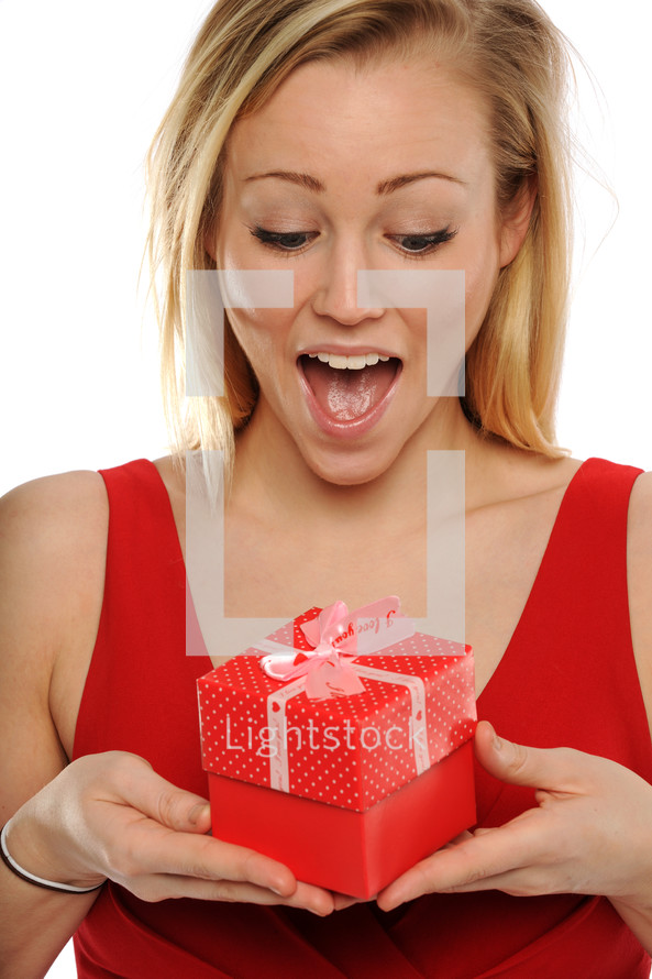 woman holding a Valentines Day gift 