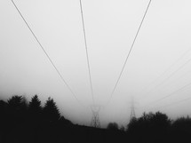 foggy sky and power lines 