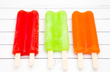 popsicles on a white background
