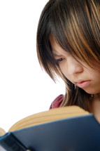 a girl reading a book 