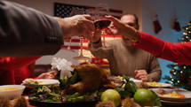 cheering and drinking wine to celebrate thanksgiving