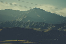 power lines and mountain peaks  