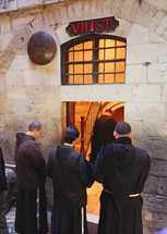 monks praying in Jerusalem 