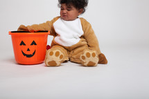 a toddler boy in a Halloween costume 