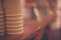 stacked paper coffee cups 