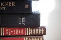 stack of books and Bible 