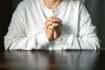 Close up of hands in prayer