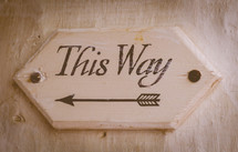 This Way arrow sign 