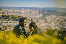 a couple in love and view of a city 