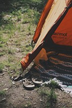 a tent and sandals 