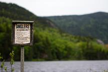 Anglers fly fishing only sign