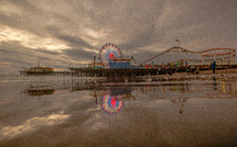 Ferris wheel on a pier at the beach.