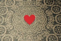 red heart on a mandala 
