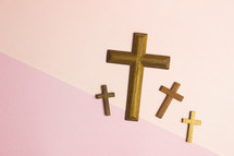 crosses on a peach and pink background 