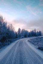 winter scene on a dirt road 
