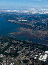 Aerial of city with clouds in the background