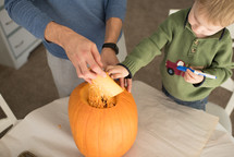 carving a pumpkin 