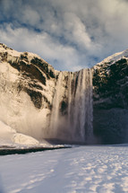 a waterfall and snow 