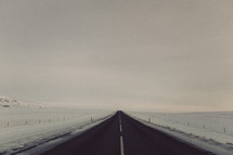 a road and snow 