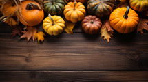 Fall background with pumpkins and leaves. Top view. 