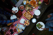 food on an outdoor table for a party 