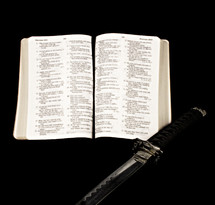 open Bible and a sword