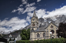 church in front of a mountain 