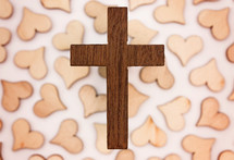 wooden cross and wood heart cutouts 
