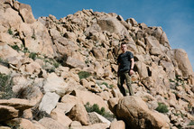 a man hiking in the desert 