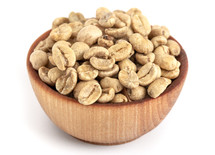 A Bowl of Raw Green Coffee Beans on a White Background