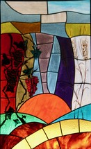 sunrise and grapes stained glass window 