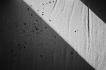 confetti on a bed