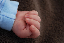 A babies hand.
