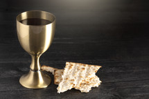 Holy Communion or the Lords Supper Isolated on a dark wood Background