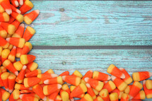 candy corn on a wood background 